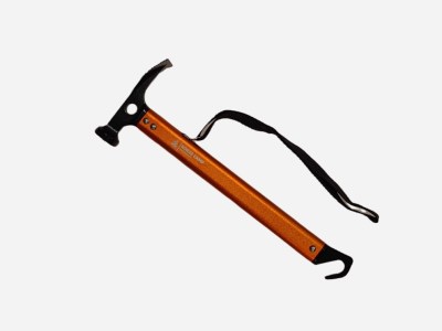 oransje hammer med hรฅndtak mot frilagt bakgrunn